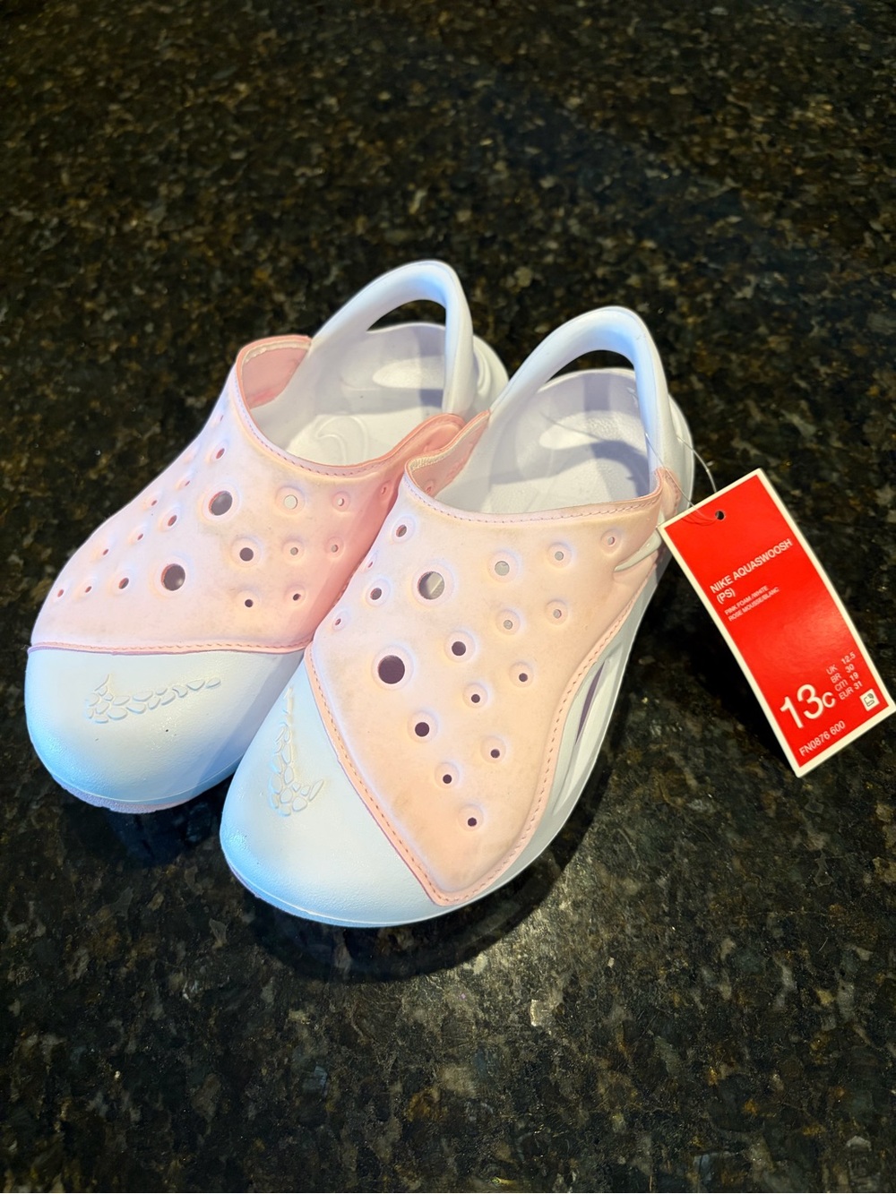 Kids Nike Slip-Ons in Pink and White